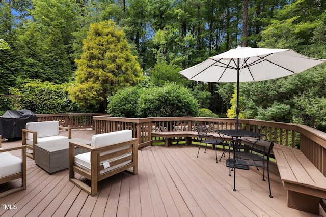 1706 Rangecrest Rd, Raleigh, NC 27612 - deck with grilling area, outdoor dining area, outdoor lounge area, and view of scattered trees