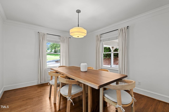 1706 Rangecrest Rd, Raleigh, NC 27612 - dining area featuring ornamental molding, baseboards, and wood finished floors