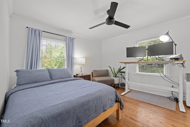 1706 Rangecrest Rd, Raleigh, NC 27612 - bedroom with crown molding, wood finished floors, multiple windows, baseboards, and ceiling fan