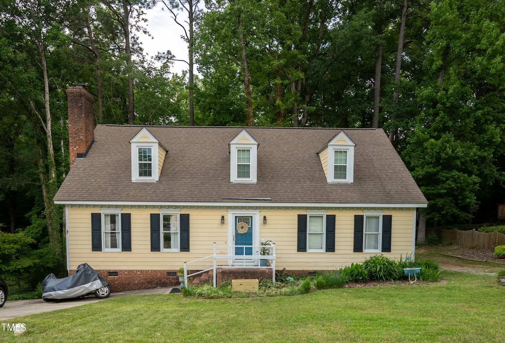 cape cod home featuring crawl space, a chimney, and roof with shingles