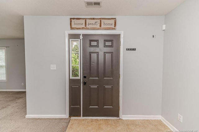 2068 Tingen Rd, Broadway, NC 27505 - entryway featuring healthy amount of natural light and baseboards