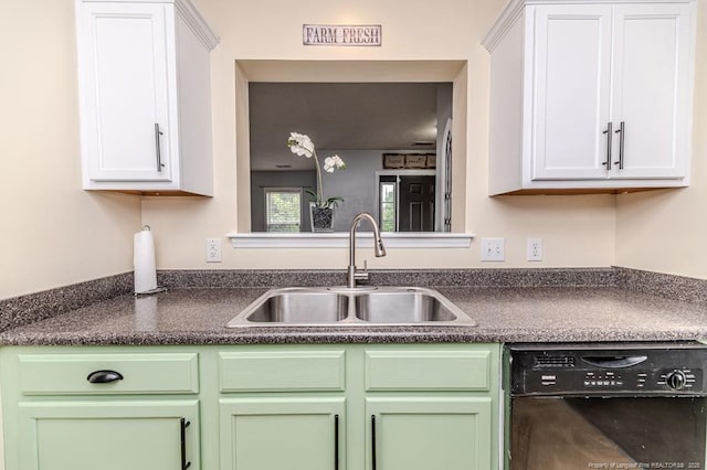 2068 Tingen Rd, Broadway, NC 27505 - kitchen with dishwasher, a sink, dark countertops, and white cabinets