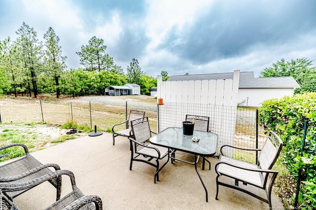 2068 Tingen Rd, Broadway, NC 27505 - view of patio with fence and outdoor dining area