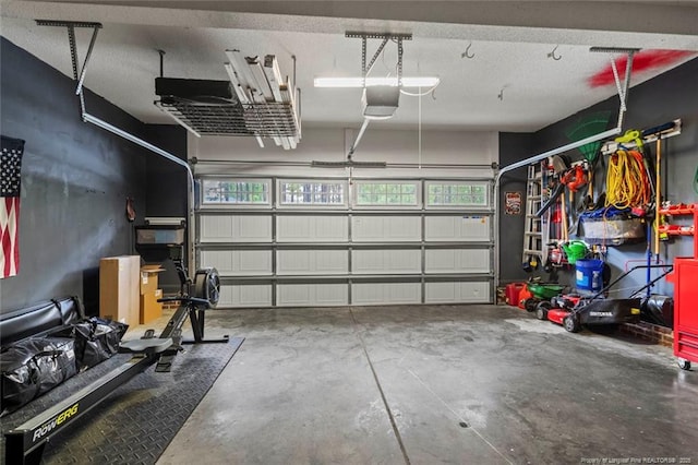 garage featuring a garage door opener