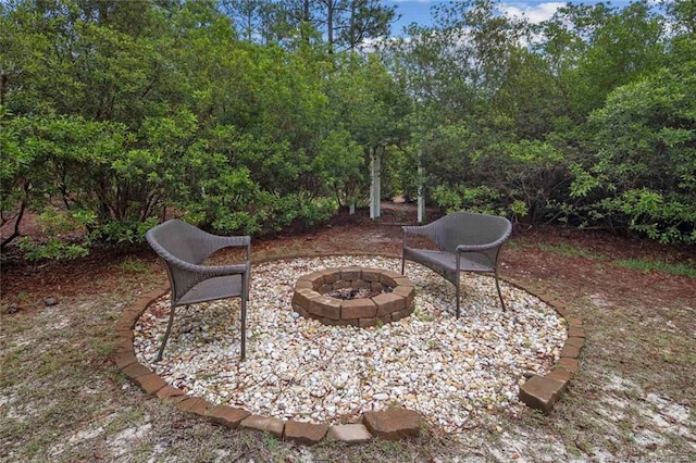 view of patio featuring an outdoor fire pit