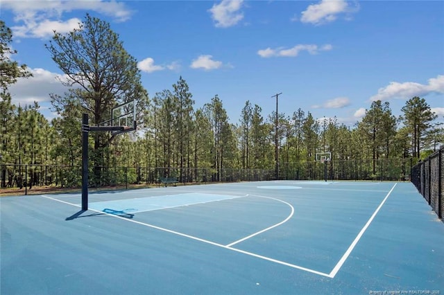view of sport court with community basketball court and fence