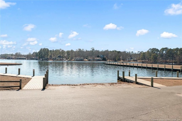 dock area featuring a water view and a boat ramp