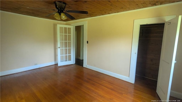 3196 Everett Chappell Rd, Mount Gilead, NC 27306 - spare room with wood ceiling, ornamental molding, baseboards, wood finished floors, and a ceiling fan
