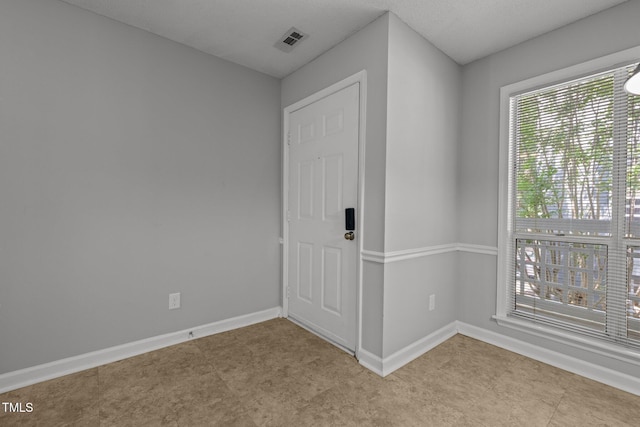 4631 Timbermill Ct Unit 203, Raleigh, NC 27612 - empty room featuring healthy amount of natural light and baseboards