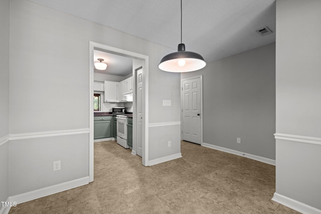 4631 Timbermill Ct Unit 203, Raleigh, NC 27612 - unfurnished dining area with baseboards and light floors