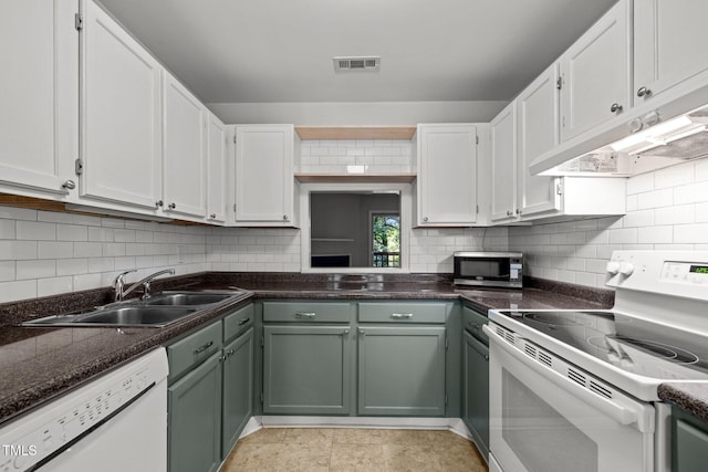 4631 Timbermill Ct Unit 203, Raleigh, NC 27612 - kitchen featuring white appliances, white cabinets, and a sink