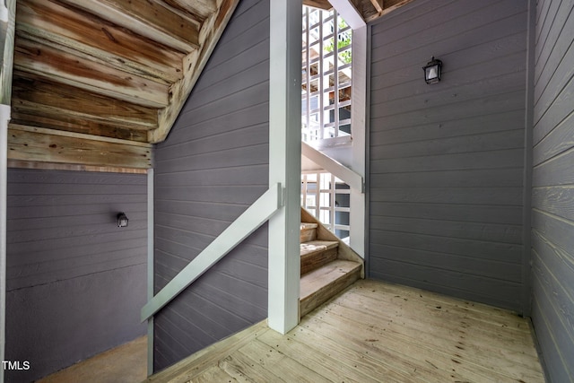 4631 Timbermill Ct Unit 203, Raleigh, NC 27612 - stairway with wooden walls, hardwood / wood-style floors, and healthy amount of natural light