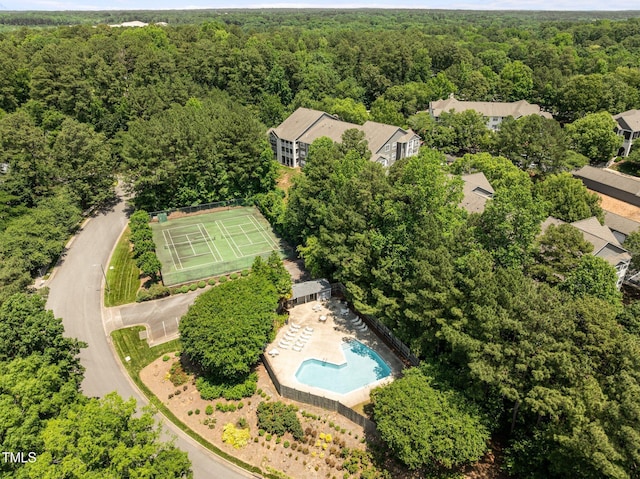4631 Timbermill Ct Unit 203, Raleigh, NC 27612 - drone / aerial view of a heavily wooded area and a pool area