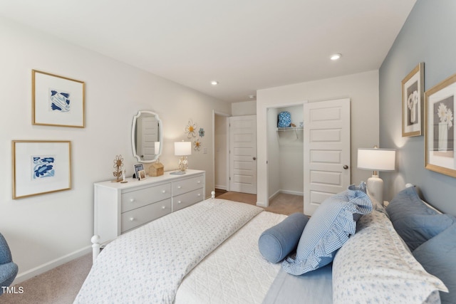 27 Cribbs Ln, Middlesex, NC 27557 - bedroom with light carpet, baseboards, a closet, a spacious closet, and recessed lighting