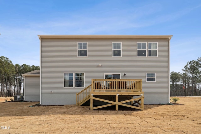 27 Cribbs Ln, Middlesex, NC 27557 - back of property featuring central AC unit and a wooden deck