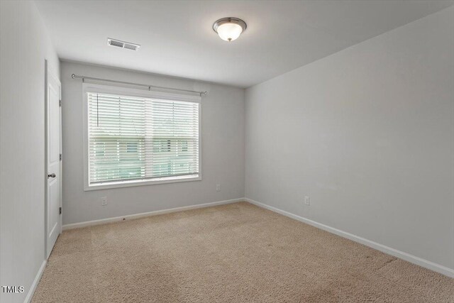 1213 Treetop Meadow Ln, Wake Forest, NC 27587 - unfurnished room with carpet and baseboards