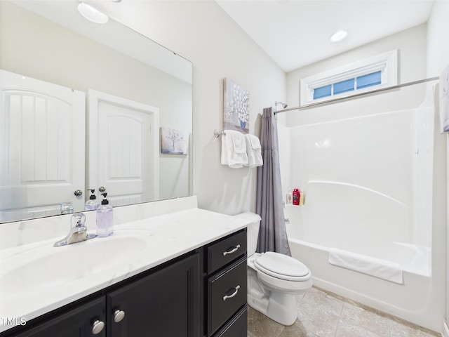 bathroom featuring toilet, vanity, shower / bath combo, and tile patterned floors