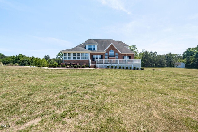 120 Gentle Rain Dr, Garner, NC 27529 - view of front facade with a front lawn and a deck