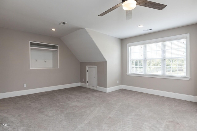 120 Gentle Rain Dr, Garner, NC 27529 - bonus room featuring light colored carpet, a ceiling fan, baseboards, recessed lighting, and lofted ceiling