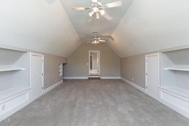 120 Gentle Rain Dr, Garner, NC 27529 - additional living space featuring light carpet, a ceiling fan, vaulted ceiling, and baseboards