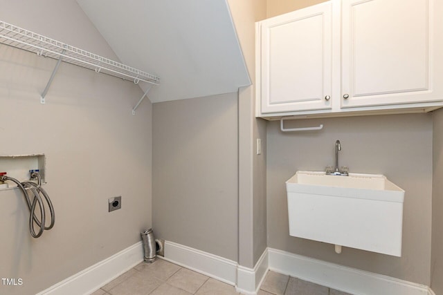 120 Gentle Rain Dr, Garner, NC 27529 - laundry room with hookup for a washing machine, light tile patterned floors, electric dryer hookup, and baseboards