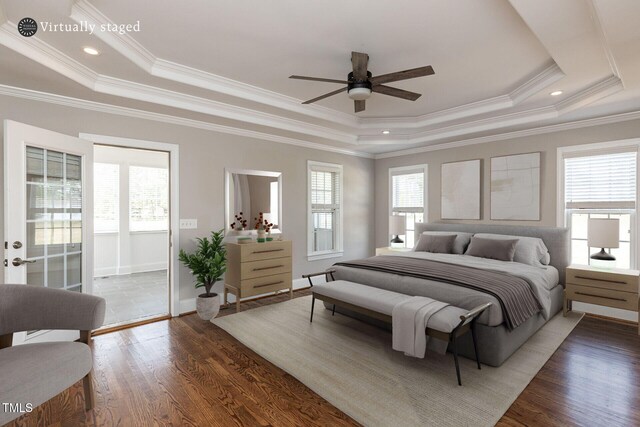 120 Gentle Rain Dr, Garner, NC 27529 - bedroom with a raised ceiling, dark wood finished floors, ornamental molding, baseboards, and ceiling fan