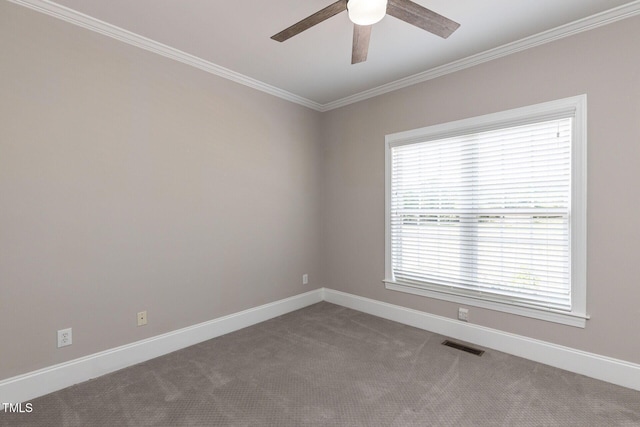 120 Gentle Rain Dr, Garner, NC 27529 - empty room featuring a ceiling fan, ornamental molding, carpet floors, and baseboards