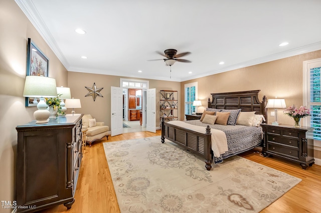 bedroom featuring ornamental molding, light wood finished floors, recessed lighting, a ceiling fan, and baseboards