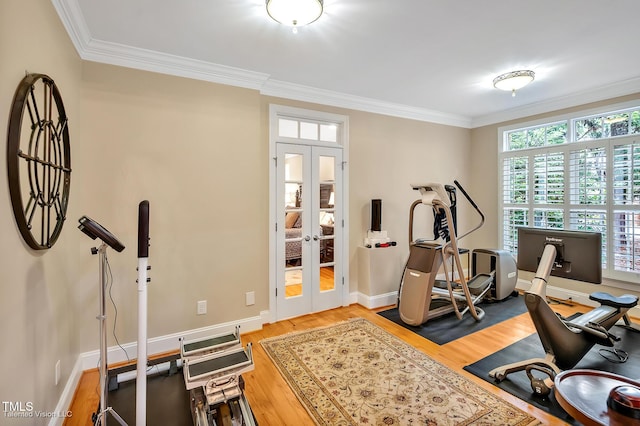 exercise room with crown molding, wood finished floors, french doors, and baseboards