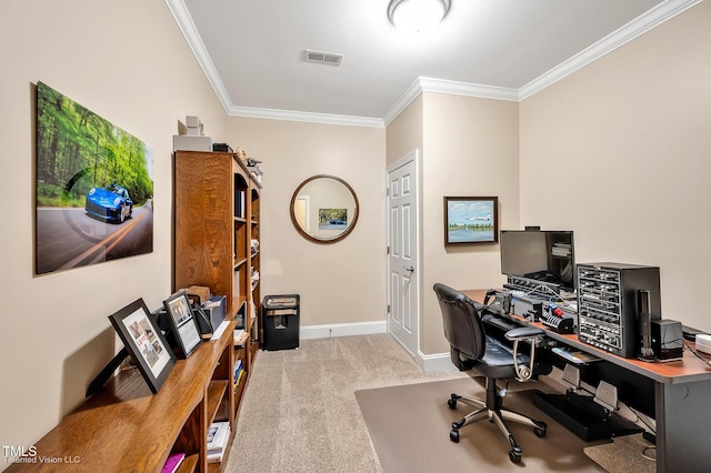 carpeted home office featuring ornamental molding and baseboards