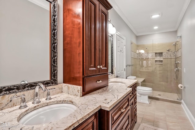 bathroom featuring a stall shower, toilet, ornamental molding, and vanity