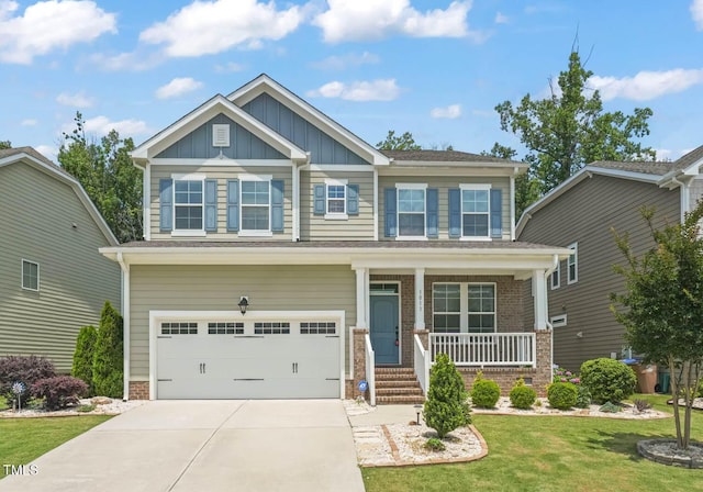 1013 Poppy Fields Ln, Wake Forest, NC 27587 - craftsman house with a garage, a porch, board and batten siding, concrete driveway, and a front yard