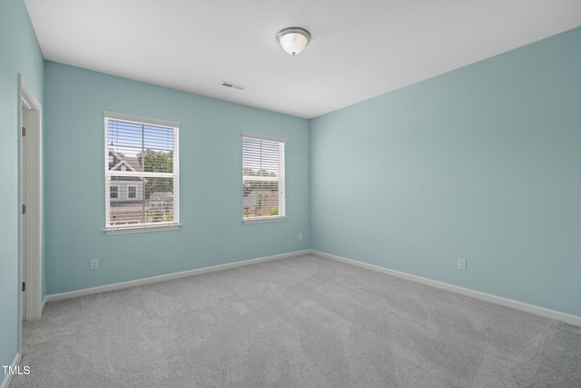 1013 Poppy Fields Ln, Wake Forest, NC 27587 - carpeted empty room with baseboards