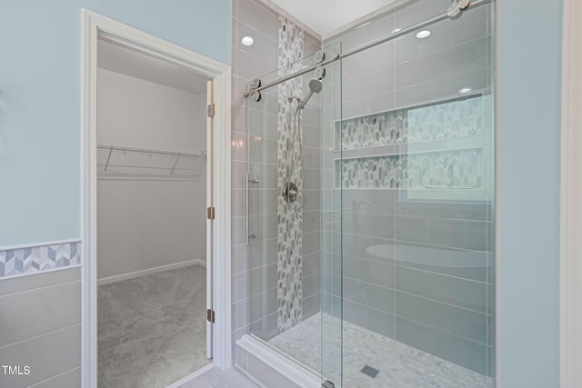 1013 Poppy Fields Ln, Wake Forest, NC 27587 - bathroom featuring a stall shower and a spacious closet