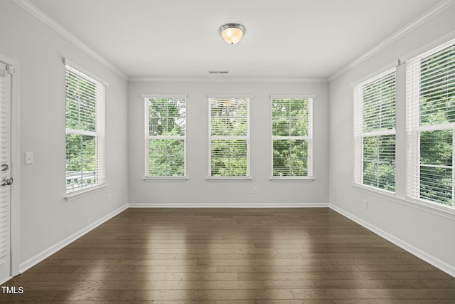1013 Poppy Fields Ln, Wake Forest, NC 27587 - spare room featuring plenty of natural light, dark wood-style floors, and ornamental molding