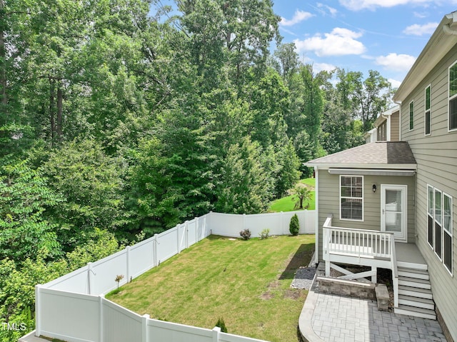 1013 Poppy Fields Ln, Wake Forest, NC 27587 - fenced backyard featuring a patio area