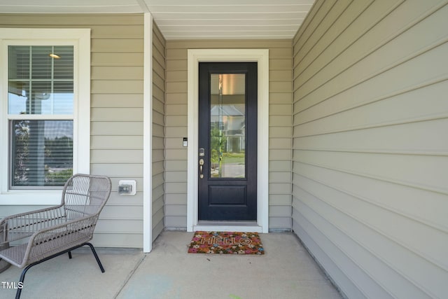 entrance to property with a porch