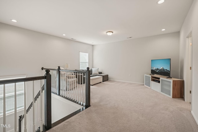 corridor with carpet flooring, an upstairs landing, recessed lighting, and baseboards