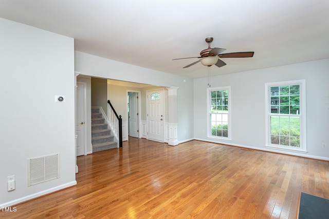 9305 Dominion Blvd, Raleigh, NC 27617 - unfurnished room featuring light wood finished floors, stairs, and ceiling fan