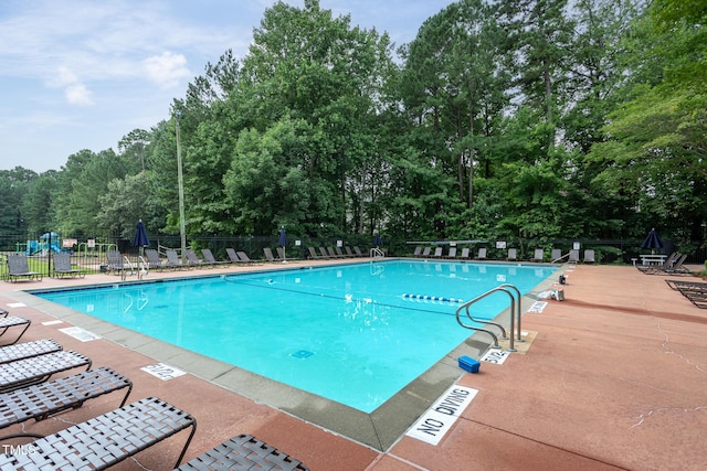 9305 Dominion Blvd, Raleigh, NC 27617 - community pool featuring view of scattered trees