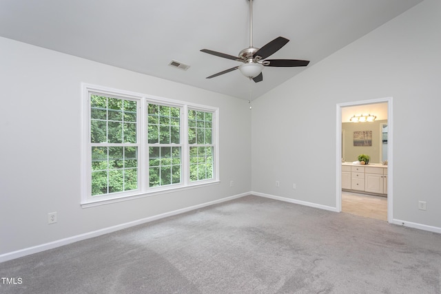 9305 Dominion Blvd, Raleigh, NC 27617 - spare room featuring light carpet, ceiling fan, and high vaulted ceiling