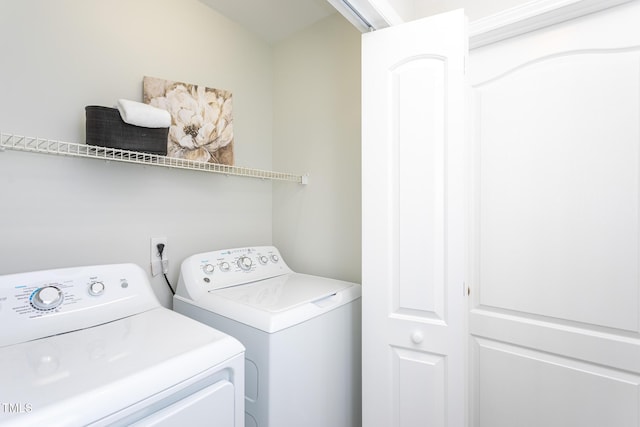 9305 Dominion Blvd, Raleigh, NC 27617 - laundry area with washing machine and dryer