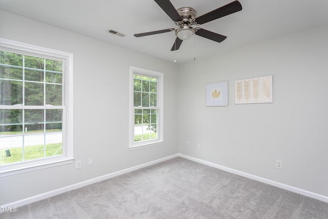 9305 Dominion Blvd, Raleigh, NC 27617 - empty room featuring carpet flooring and a ceiling fan