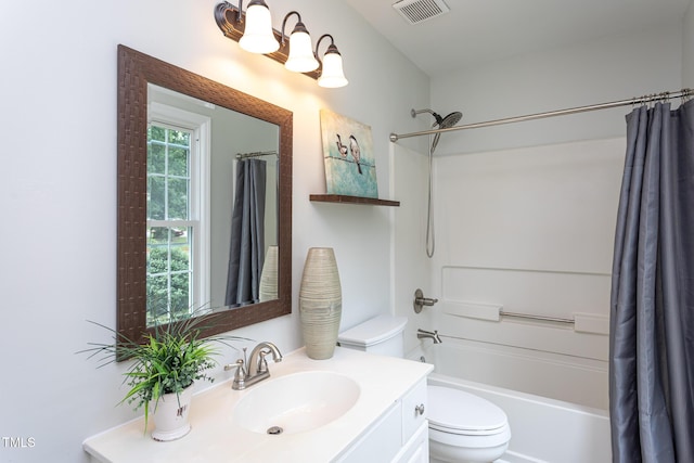 9305 Dominion Blvd, Raleigh, NC 27617 - full bathroom featuring vanity and shower / bath combo with shower curtain