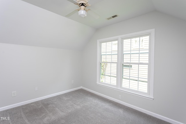 9305 Dominion Blvd, Raleigh, NC 27617 - additional living space with vaulted ceiling, a ceiling fan, and carpet floors