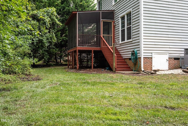 9305 Dominion Blvd, Raleigh, NC 27617 - view of grassy yard with a sunroom and stairs