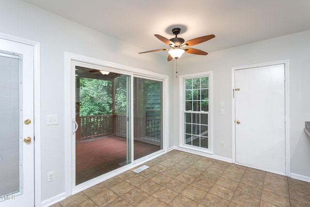 9305 Dominion Blvd, Raleigh, NC 27617 - entrance foyer featuring a ceiling fan and stone finish flooring