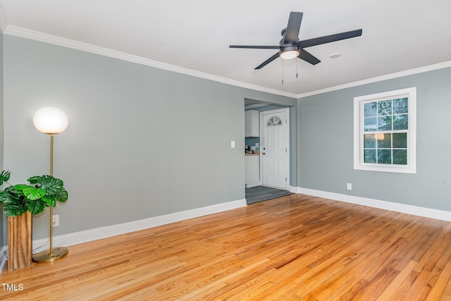 4420 W River Rd, Franklinton, NC 27525 - unfurnished room with light wood finished floors, crown molding, baseboards, and a ceiling fan