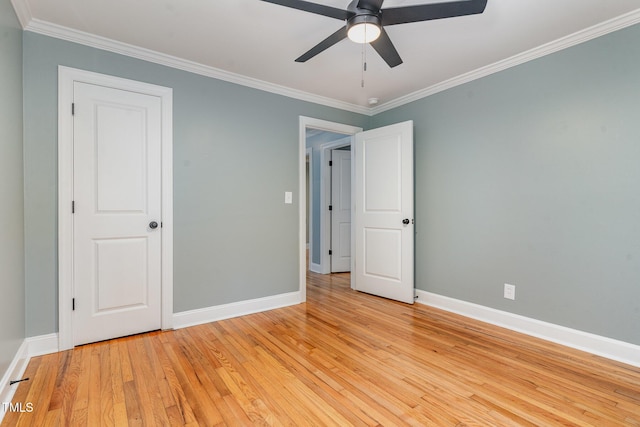 4420 W River Rd, Franklinton, NC 27525 - unfurnished bedroom featuring light wood-style flooring, crown molding, baseboards, and a ceiling fan