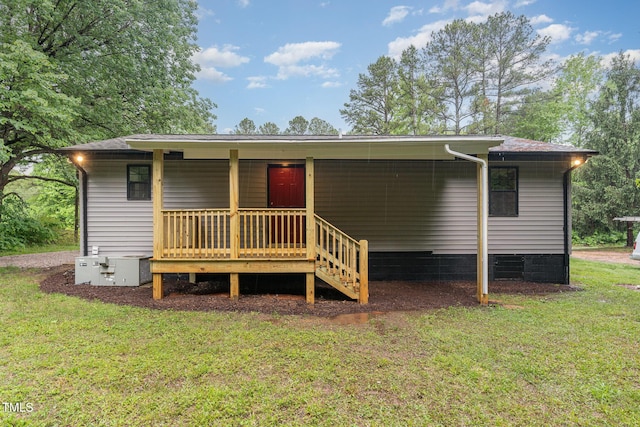 4420 W River Rd, Franklinton, NC 27525 - view of front of home featuring a front lawn, crawl space, and a porch